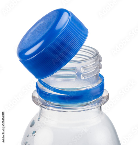 Plastic bottle with attached cap isolated on a white background, highlighting sustainable packaging and environmental protection concepts.