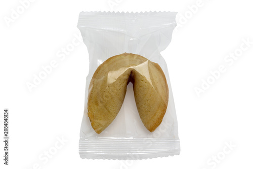 Fortune cookie sealed in plastic bag, isolated, on transparent background, png