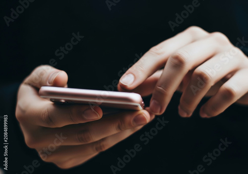 Close up shot of human hands using modern mobile phone device for online communication social media engagement digital connectivity touch screen.