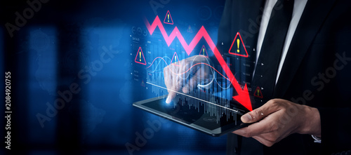 Obraz na płótnie Economic caution visualized with fluctuating market graph, alert symbols, and negative data trends