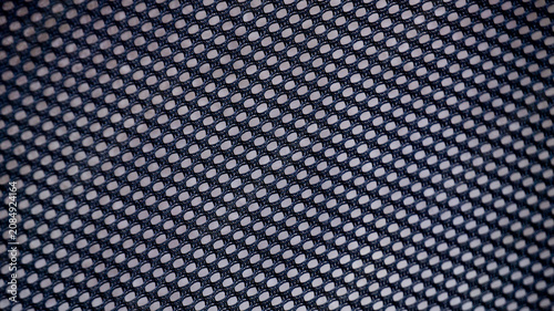 Tableau sur toile Black Perforated Mesh Texture Background Close Up