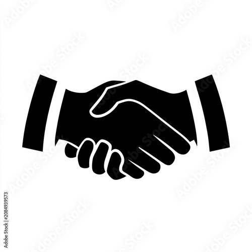 Two silhouetted hands clasped in a firm handshake, symbolizing agreement and partnership