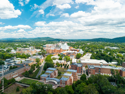 Quadro su tela Charlottesville, Virginia, wide aerial drone view looking over the expansive Uni