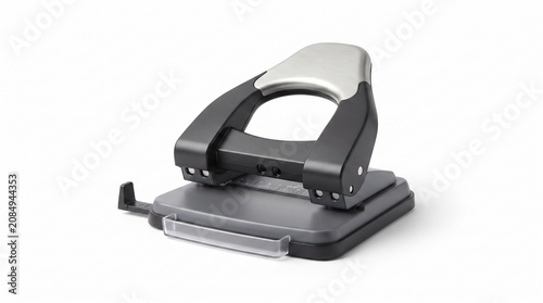Modern metal two hole paper puncher on white background