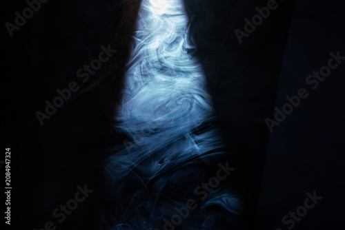 Canvas Print Dimly lit room with smoke, cool color scheme blue dominating, mysterious atmosph