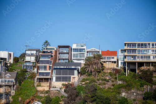 Modern Coastal Homes Along Hillside Landscape