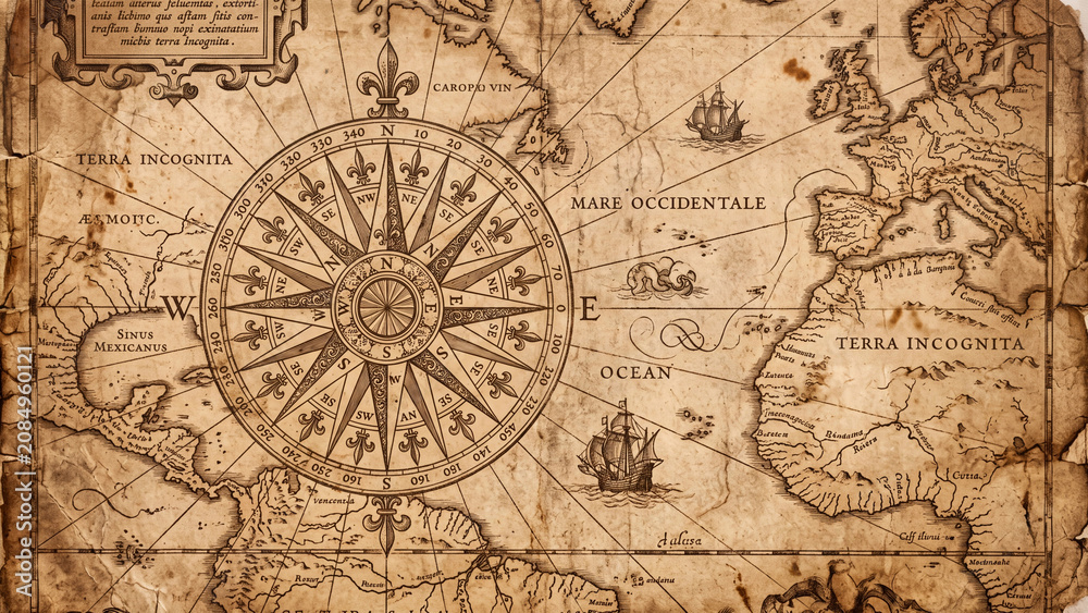 Fototapeta premium Vintage antique map with a compass rose and ships sailing on the ocean with terra incognita labeled on the sides