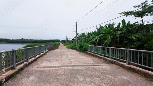 Walking along the road in Kim Long, Ho Chi Minh, Vietnam