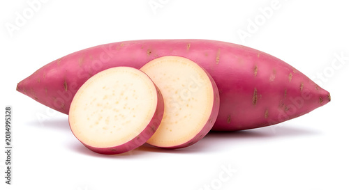 Whole and sliced purple sweet potato on white background