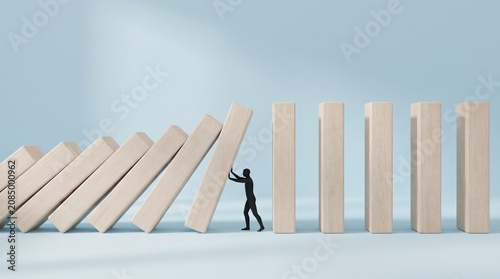 Foto Human silhouette stopping falling wooden domino blocks, risk management, crisis