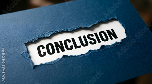 Torn blue paper reveals conclusion text