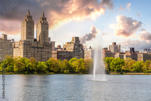 Skyline panorama with Eldorado building and reservoir with fountain in Central Park in midtown Manhattan in New York City