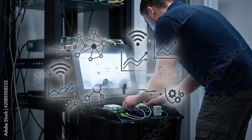 IT technician managing server rack and network equipment with digital overlay graphics showing connectivity and data flow.