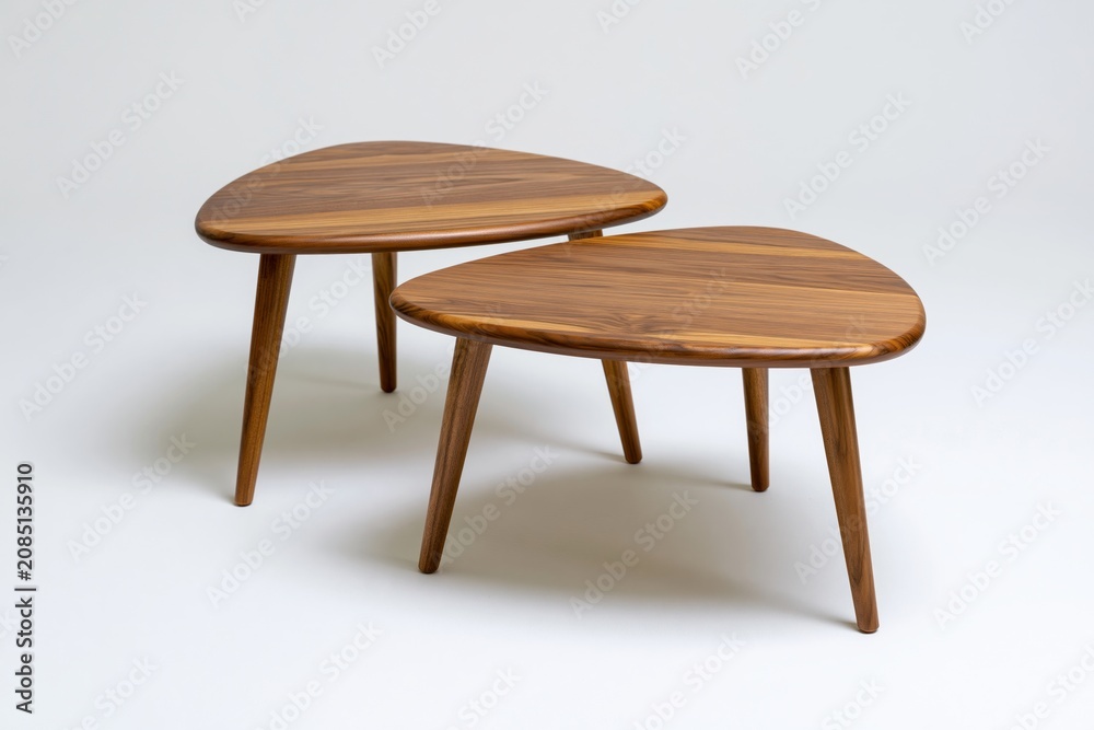 Fototapeta premium The Wooden Nested Coffee Tables with Midcentury Modern Style and Warm Grain