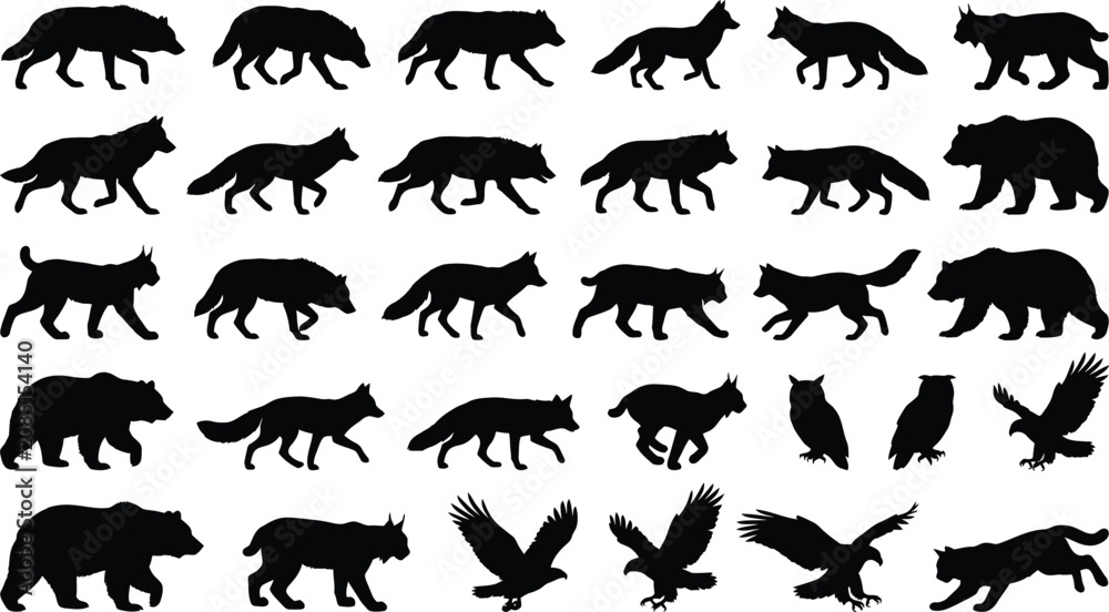 Obraz premium Collection of black silhouettes of wild animals, including wolves, foxes, bears, lynx, owls, and eagles
