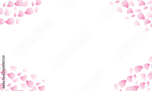 Beautiful pink cherry blossom flower petals falling in the corners of the frame