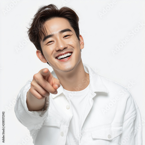 Smiling Man Pointing at Camera, Recommendation and Presentation Concept