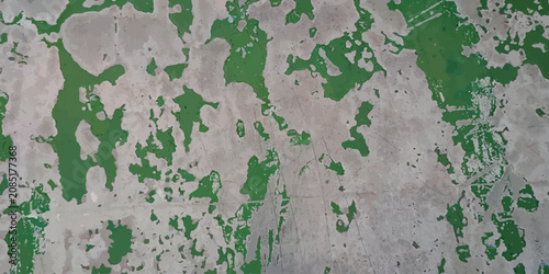 Cuadro en lienzo Weathered concrete wall with patches of peeling green paint concrete weathered d