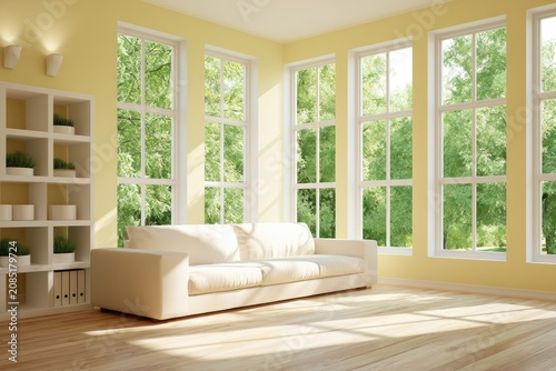 Sun-drenched living room with white sofa, shelves, and large windows