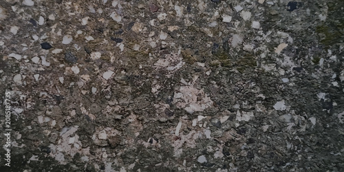 Fotografie Dark granite stone texture background with background speckled material abstract