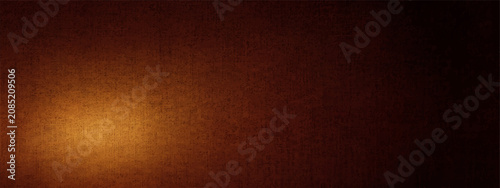 Konstfotografi A warm, glowing spotlight illuminates a textured surface, creating a dramatic and moody atmosphere