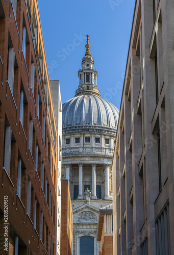 Photography St Paul cathedral dome framed by London buildings