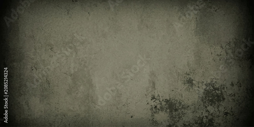 Tableau sur toile A textured, vintage concrete wall with subtle variations in tone and scattered dark imperfections, evoking a sense of aged decay and urban grit