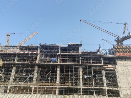 Fotografie High rise under construction building with their incomplete structure