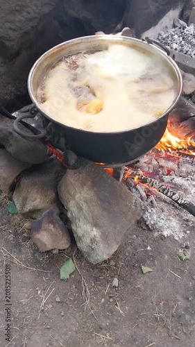 Making natural mulberry molasses in the village.