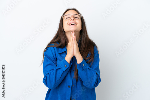 Konstfotografi Young Ukrainian woman isolated on white background keeps palm together