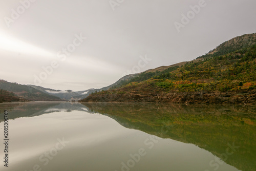 The reflection in the dam lake,