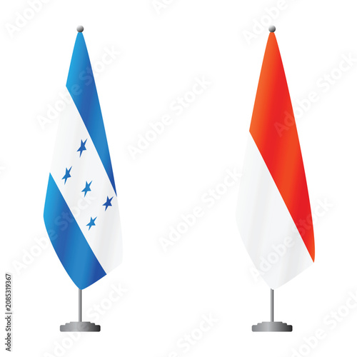 Foto Honduras and Indonesia flags on flagpoles for official ceremonies and meetings,
