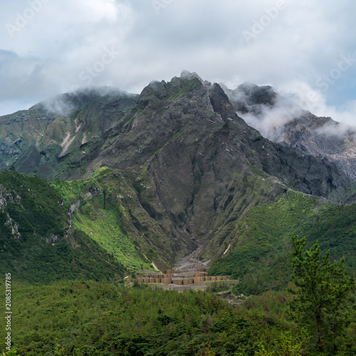 Majestic View of Sakurajima Volcano Under a Cloudy Sky