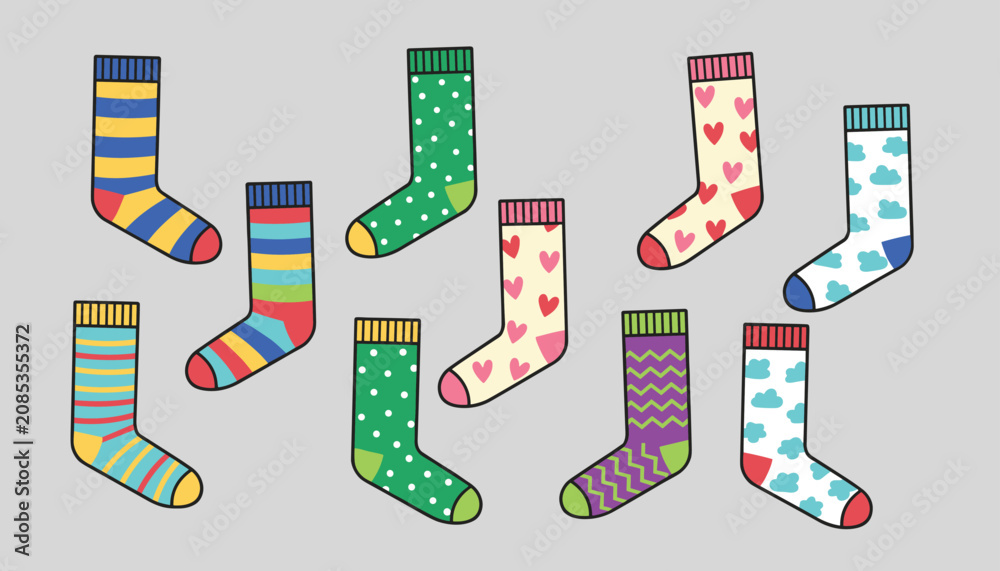 Obraz premium Lovely collection of colorful cute patterned socks with stripes, hearts, clouds, and dots on a grey background.