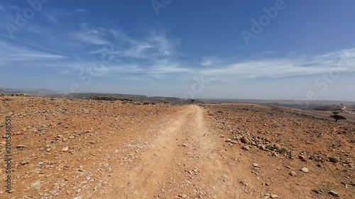 Rocky dirt road in a desert landscape. Sokoctra, Yemen.