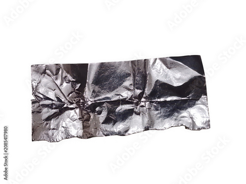 Single crumpled piece of silver metallic foil sheet