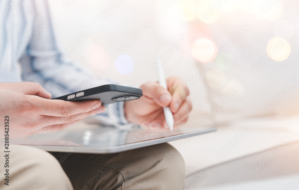 Fototapeta premium Person using Smartphone, Laptop for Email Communication, Business Productivity, Online Workflow.Mobile Connectivity,Digital Communication,Remote Work, Secure Information Access in Modern Technology 