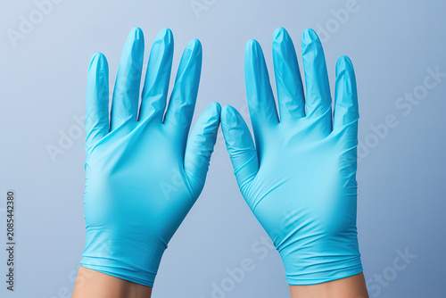 Beautiful Plastic dish washing gloves isolated on white background