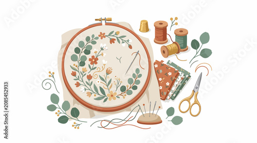 Quadro su tela Colorful embroidery hoop with floral design and sewing tools.