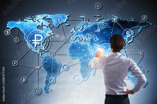 Back view of person interacting with glowing global currency network map with...
