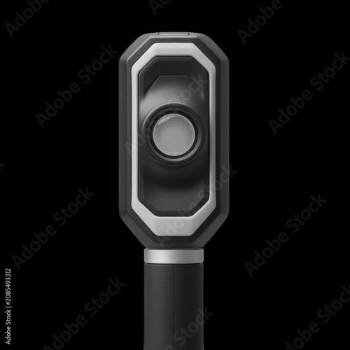 Modern black traffic signal camera on pole
