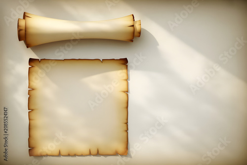 Old Scroll and Parchment on White Surface with Shadow