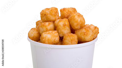 Fotografie Crispy golden potato tots in white paper cup