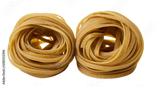Quadro su tela Two nests of uncooked fettuccine pasta