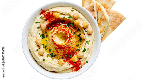Fotografía Creamy hummus with chickpeas paprika parsley olive oil, and pita bread