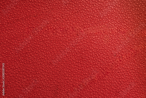 Schilderij op canvas Abstract vivid red textured background featuring soft vertical gradient stripes and a fine granulated surface pattern, ideal for commercial microstock design backdrops
