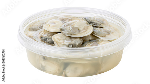 Vászonkép Fresh oysters in brine in a clear plastic container
