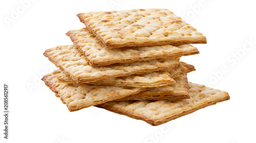 Tableau sur toile Stack of square crackers with flaky layers and dimpled surface