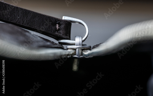 Macro Shot of Metal Zipper Slider on Leather Bag