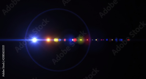 A dark background showcases a lens flare, creating a vibrant spectrum of colors along its length.